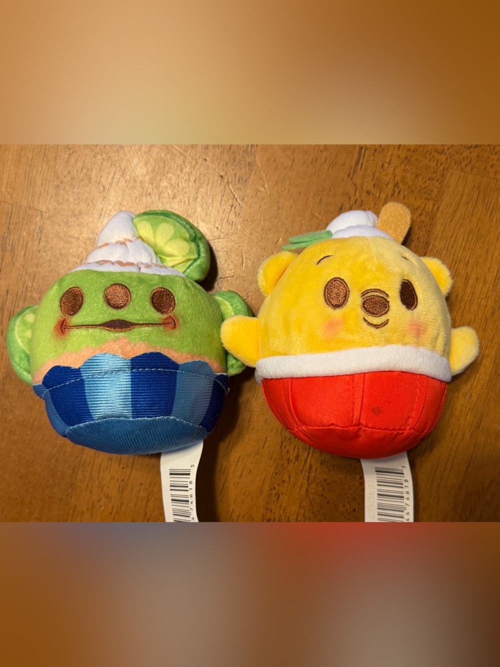 Disney Munchlings Stuffed Winnie the Pooh and Toy story alien